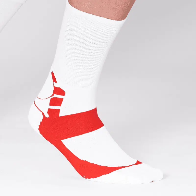 Calcetín de compresión blanco y rojo